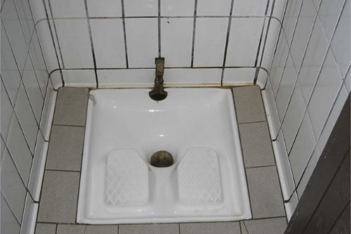 Hole toilet in Italy